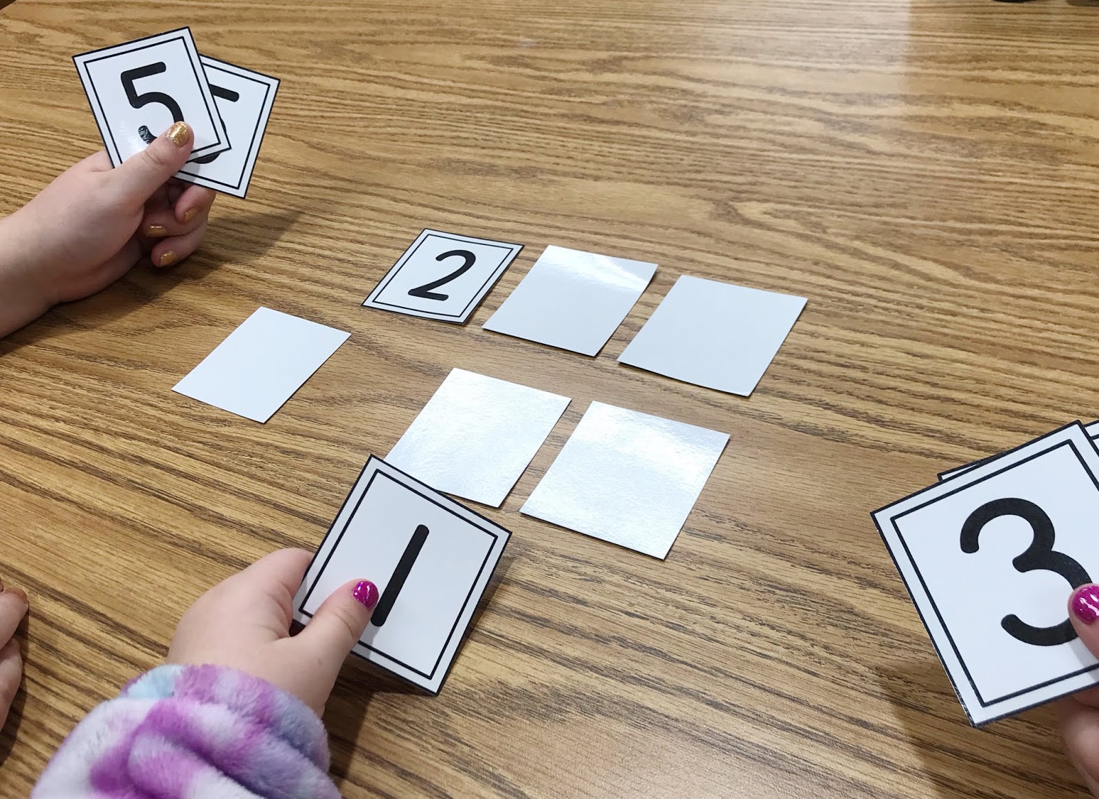 Need some fun ideas to help with number recognition and counting for your elementary students? Be sure to check out this blog post and print the freebie! Practicing numbers and counting is made simple, with these games. They are perfect for small groups, centers, or fast finishers. One game allows for instant differentiation for students who need extra attention. Students will enjoy a change of pace to play a "game", while utilizing their number recognition skills {elementary, counting, freebie}