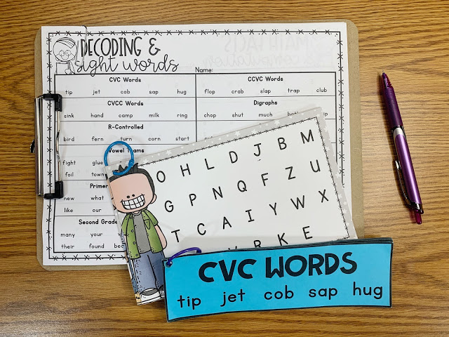 Image of Clipboard with Worksheet of Decoding and Sight Words with Paper with CVC Words Listed